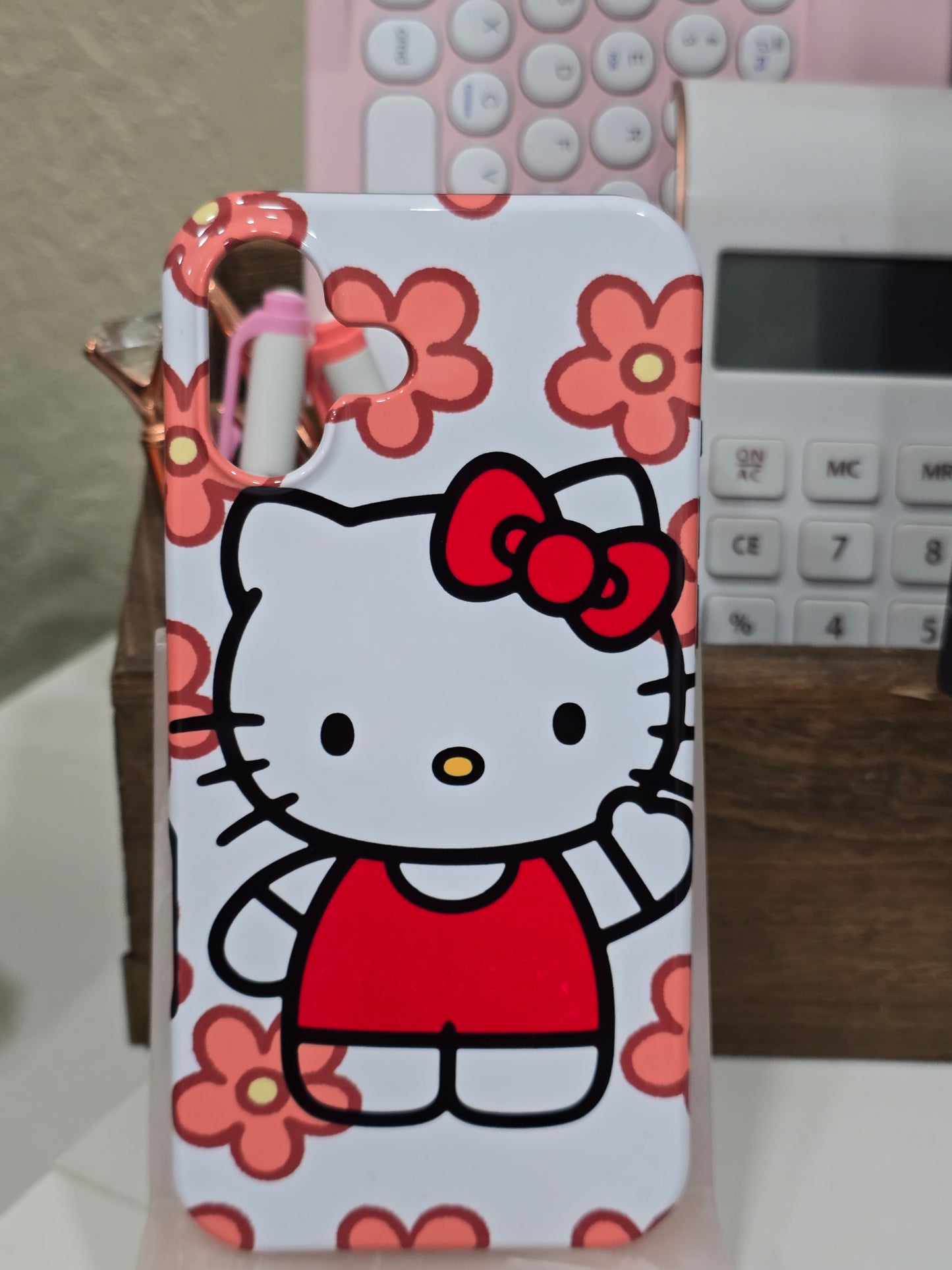 Pink and Red Hello Kitty with Flowers Phone Case for IPhone 16 Plus Glossy 2-in-1 Silicone Interior