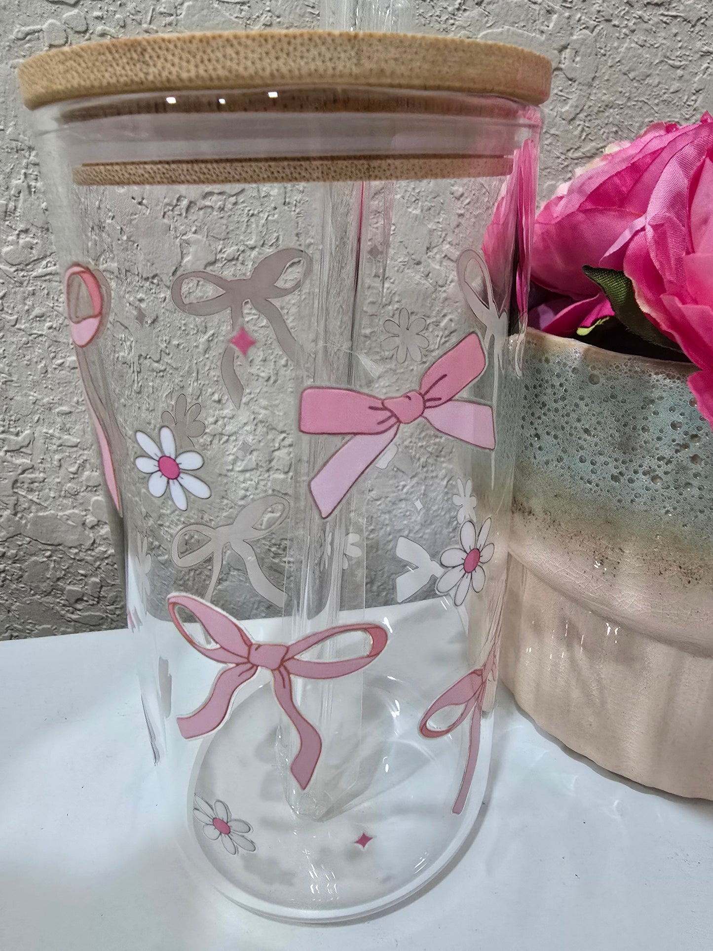 16 oz. Pink Bow with White Flower Glass Cup Iced Coffee Cocktail Tumbler with Lid and Straw